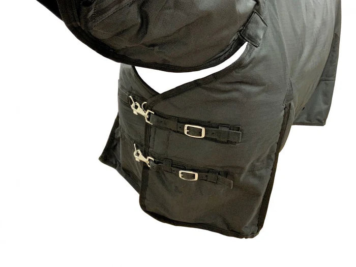 Close-up of a dark gray jacket with buckles on a white background