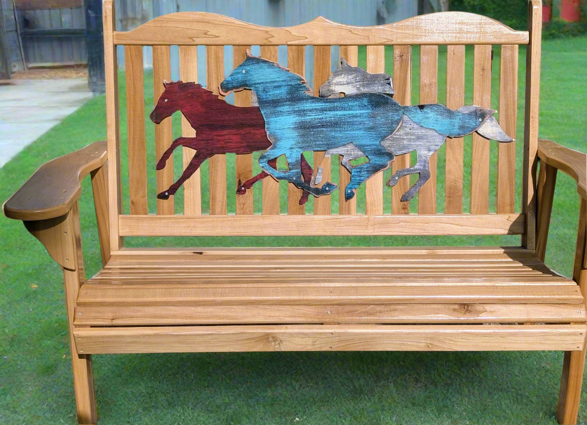 Wooden bench with horse cutouts on a pavement background