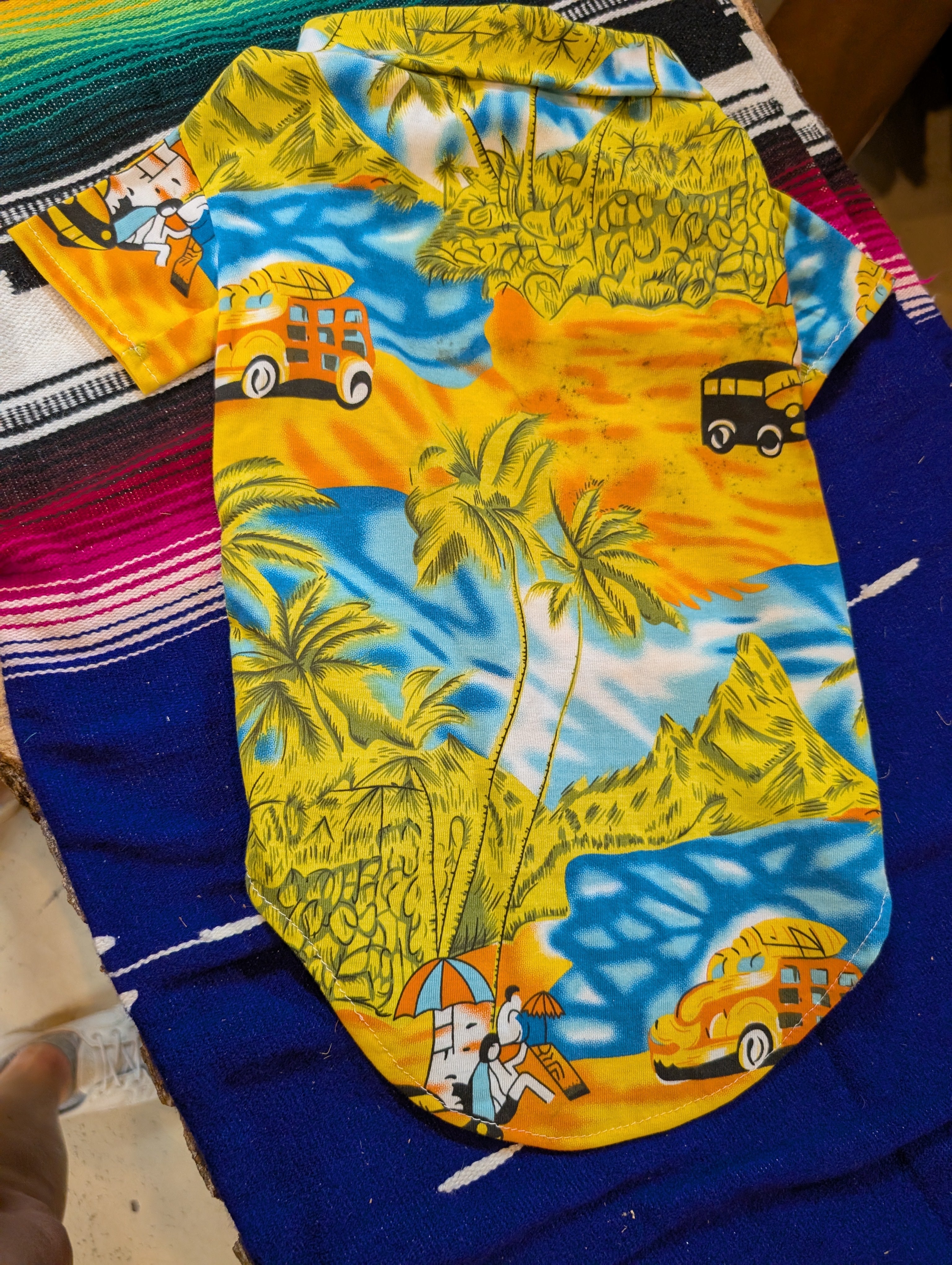 Close-up of colorful dog beachwear fabric with summer theme