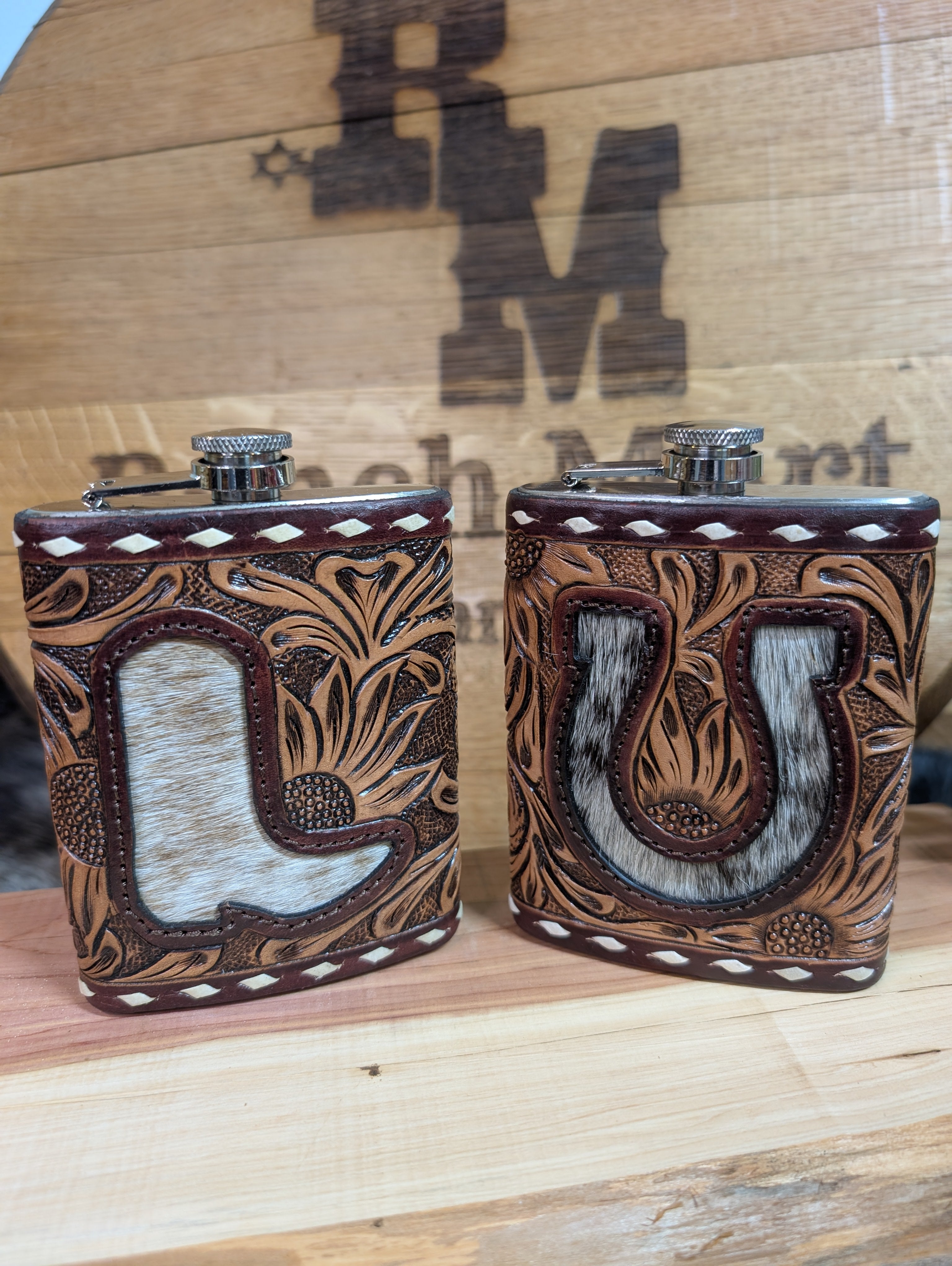 Two flask with bootstitch and cowhide
