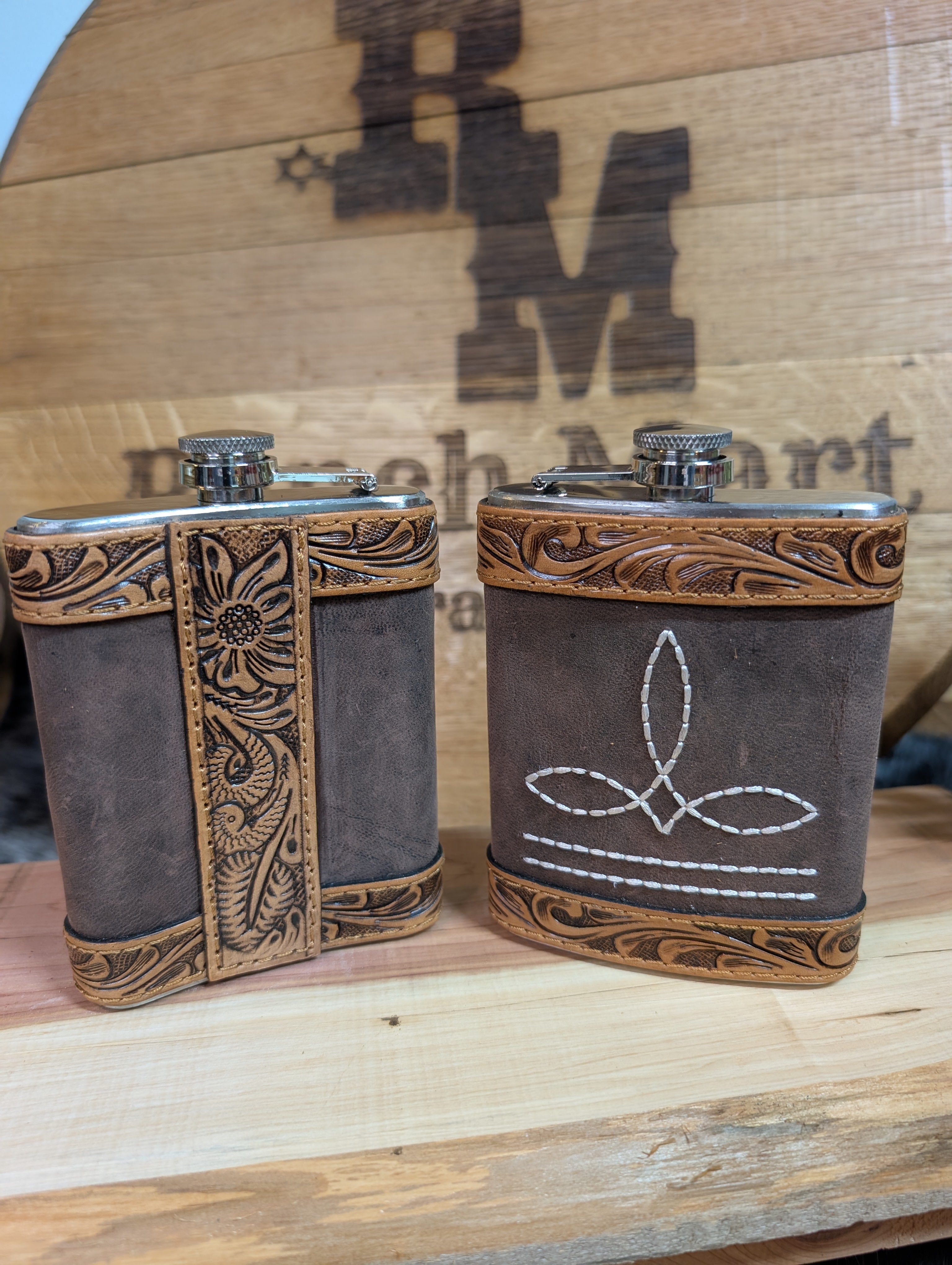 Flask with boot stitch and leather