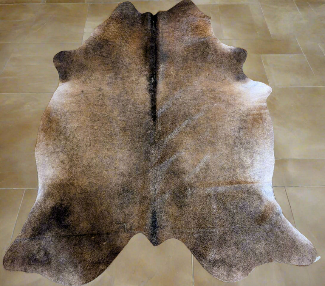Genuine brown cowhide rug – authentic Grade A leather ideal for rustic or Western home decor