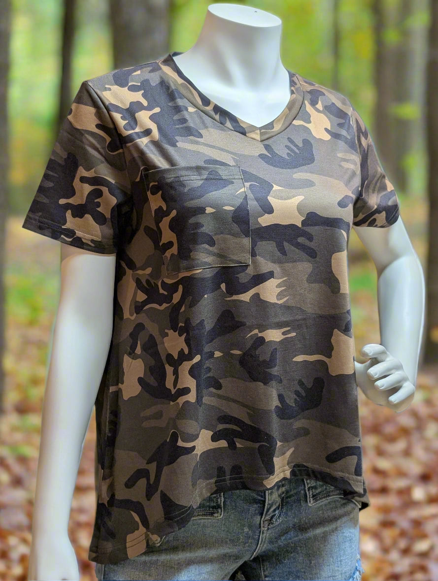 Camouflage t-shirt on a mannequin with a forest background