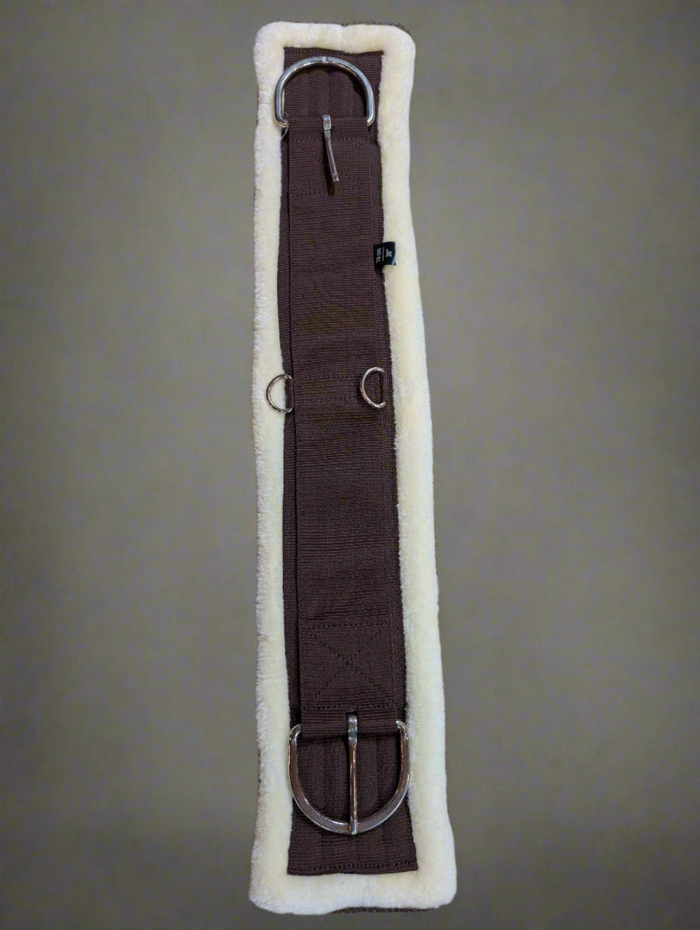 Brown nylon horse girth with soft fleece underside and stainless steel buckles for moisture-wicking comfort.