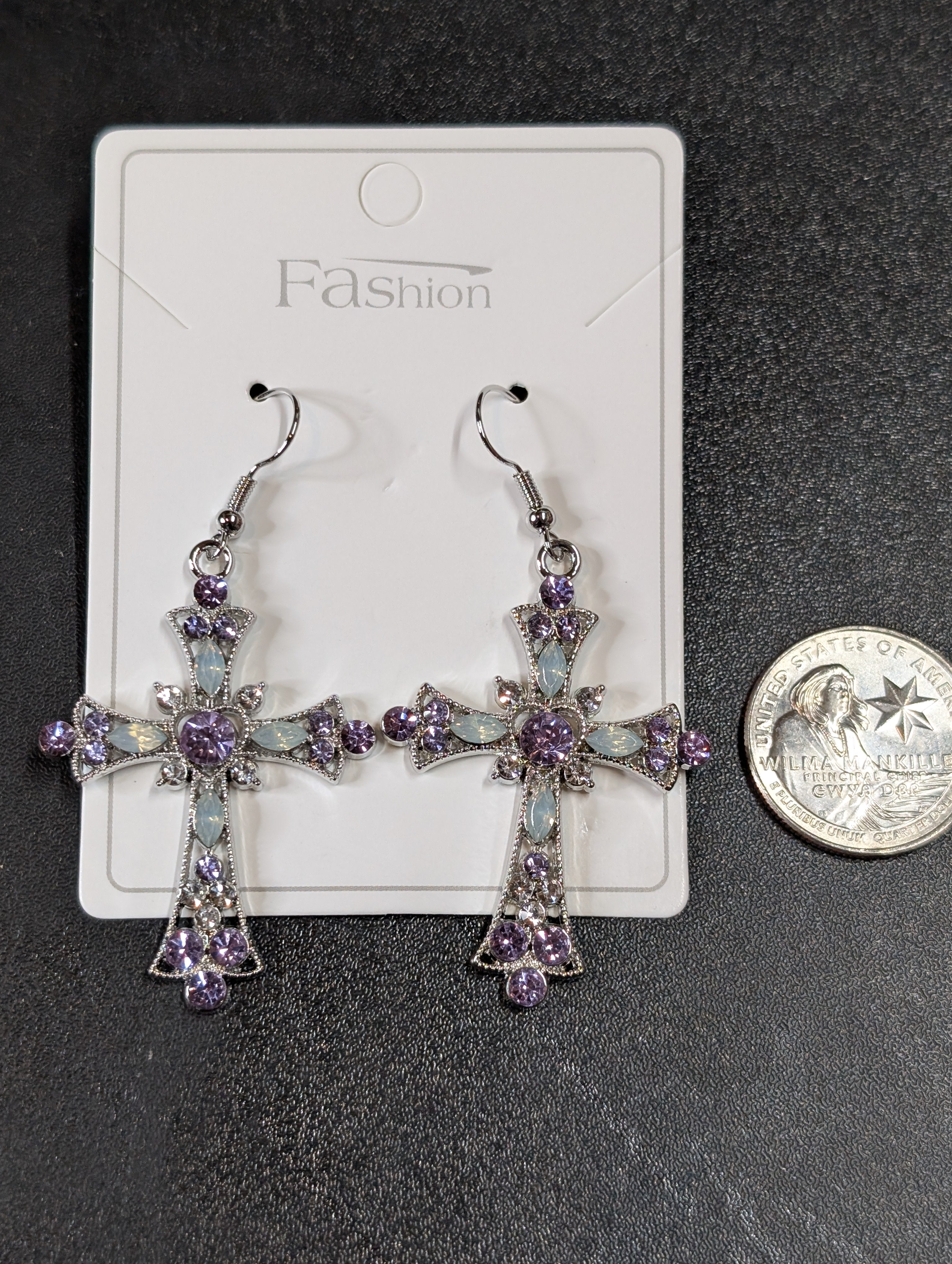 Cross-shaped dangle earrings with sparkling crystals available in two colors