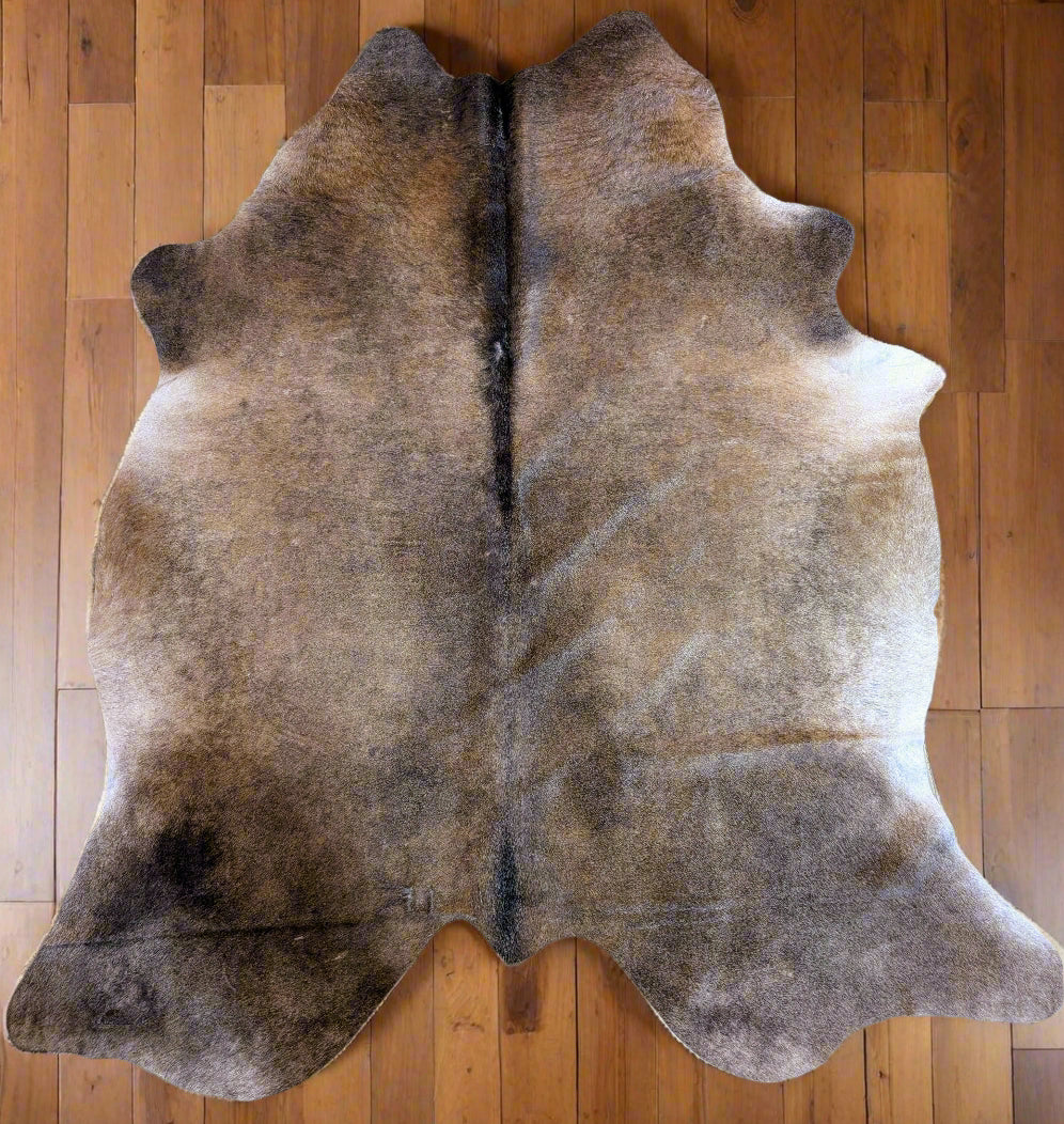 Genuine brown cowhide rug – authentic Grade A leather hide shown in photo, ideal for rustic or Western home decor