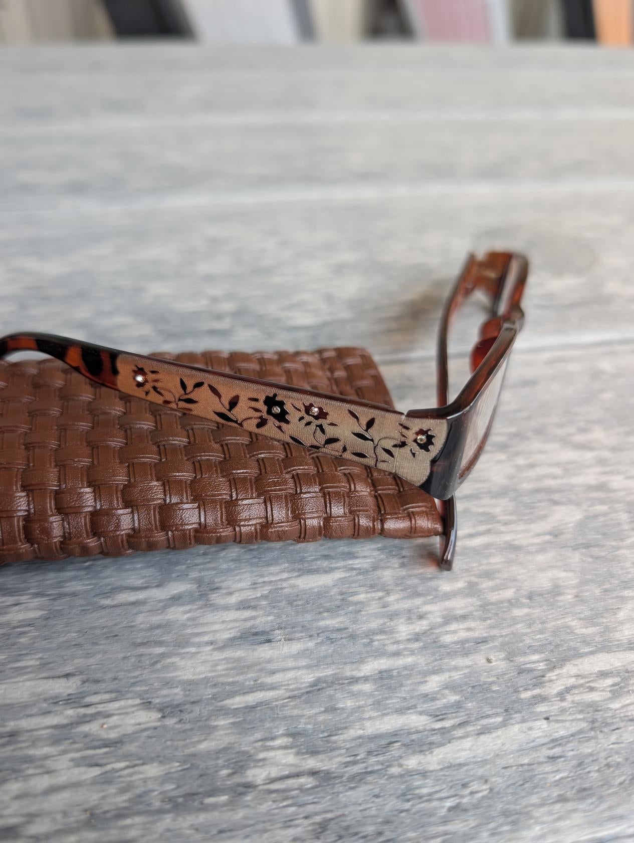 Close-up of stylish reader glasses