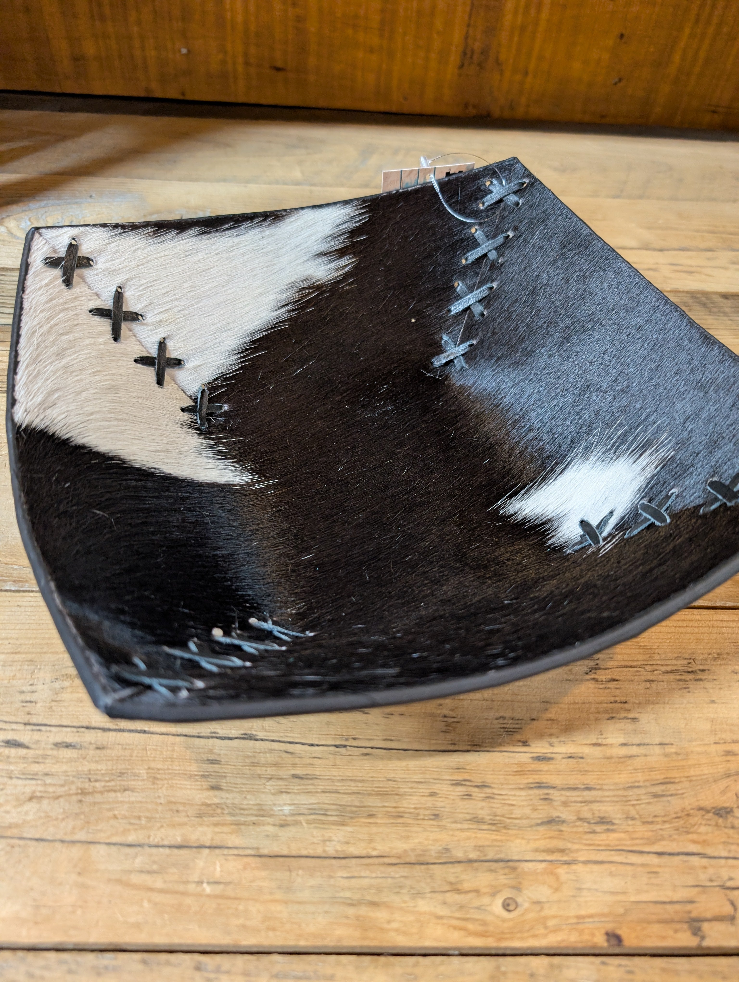 cowhide and leather bowl