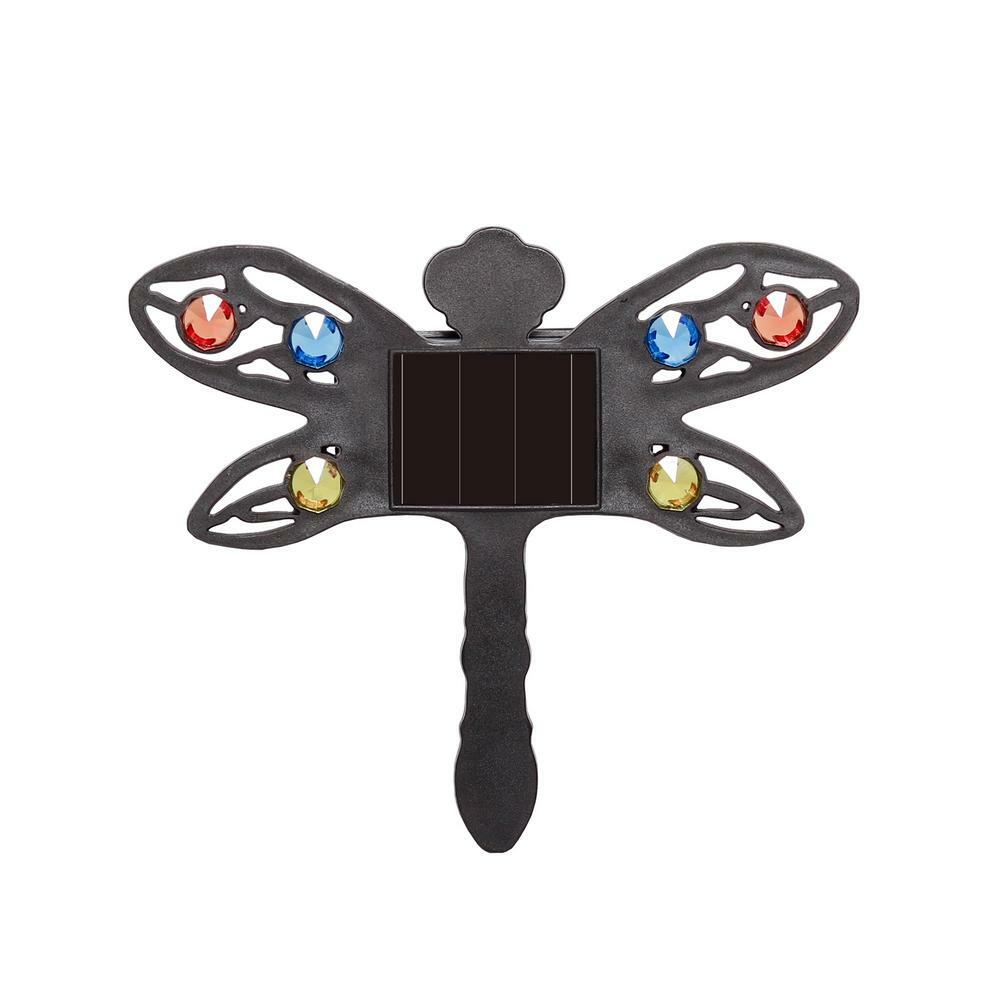 Westinghouse solar dragonfly lights in Remington Bronze with warm white LED glow