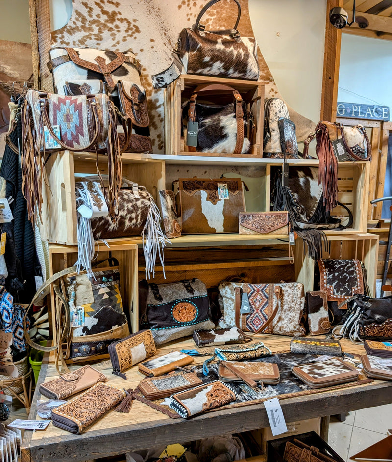 Display of genuine cowhide purses and wallets