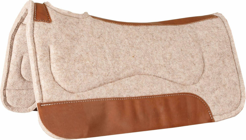 Light gray built up saddle pad with brown wear leathers
