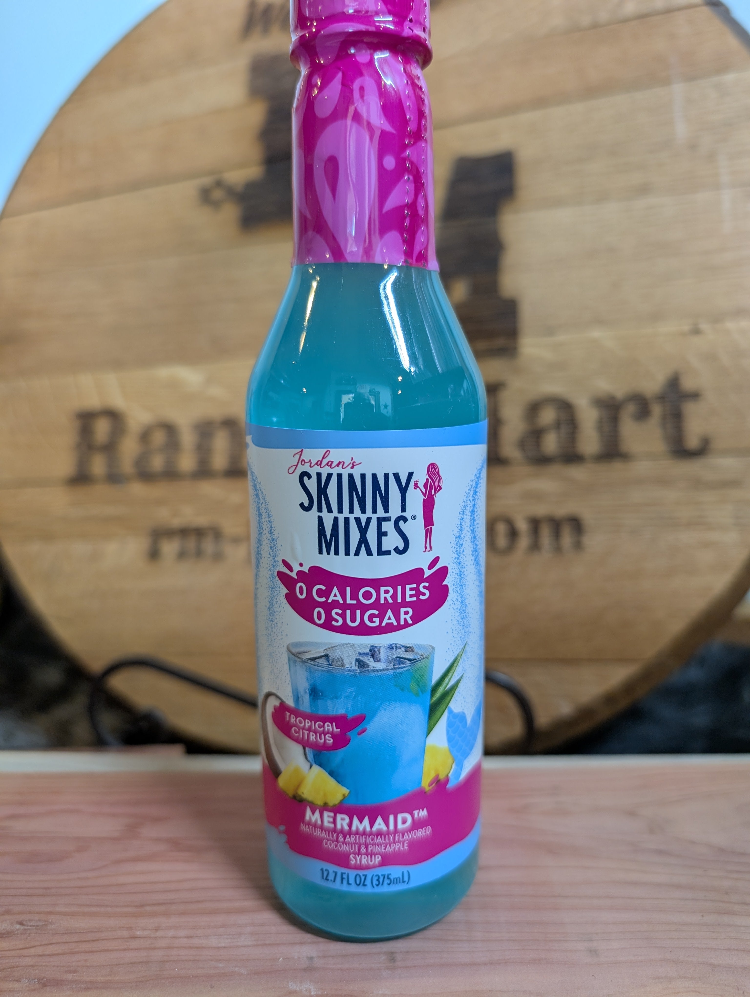 A bottle of Jordan's Skinny Mix in Mermaid flavor, a low calorie beverage with 0 calories per serving.