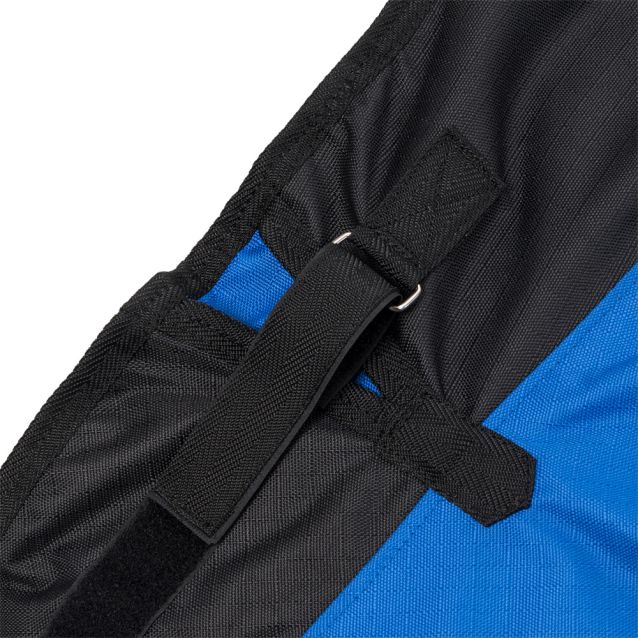 Close-up of Tough1 Snuggit adjustable neck feature with buckle strap and hook-and-loop closure on blue horse turnout shee