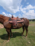 13 inch youth Western saddle with bicycle-style seat and floral tooling