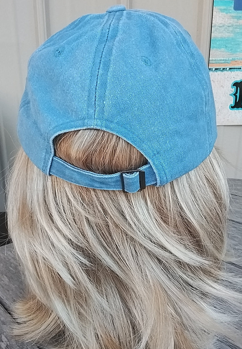 Blue cap on a wig with a blurred background