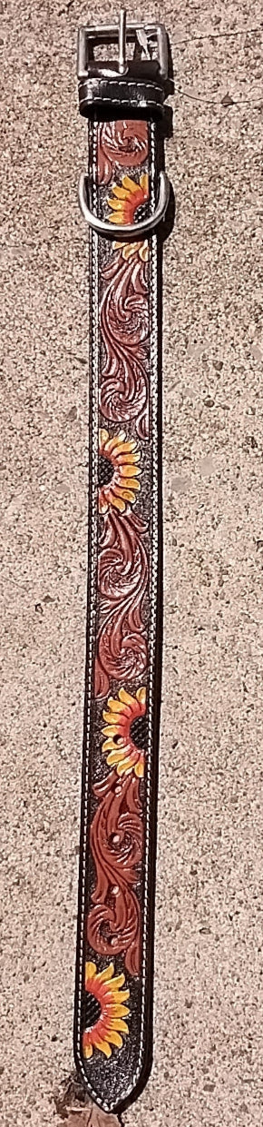 Decorative leather dog with Sunflowers on a concrete surface