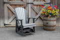 2' Swivel Glider Black and Grey in front of a barn