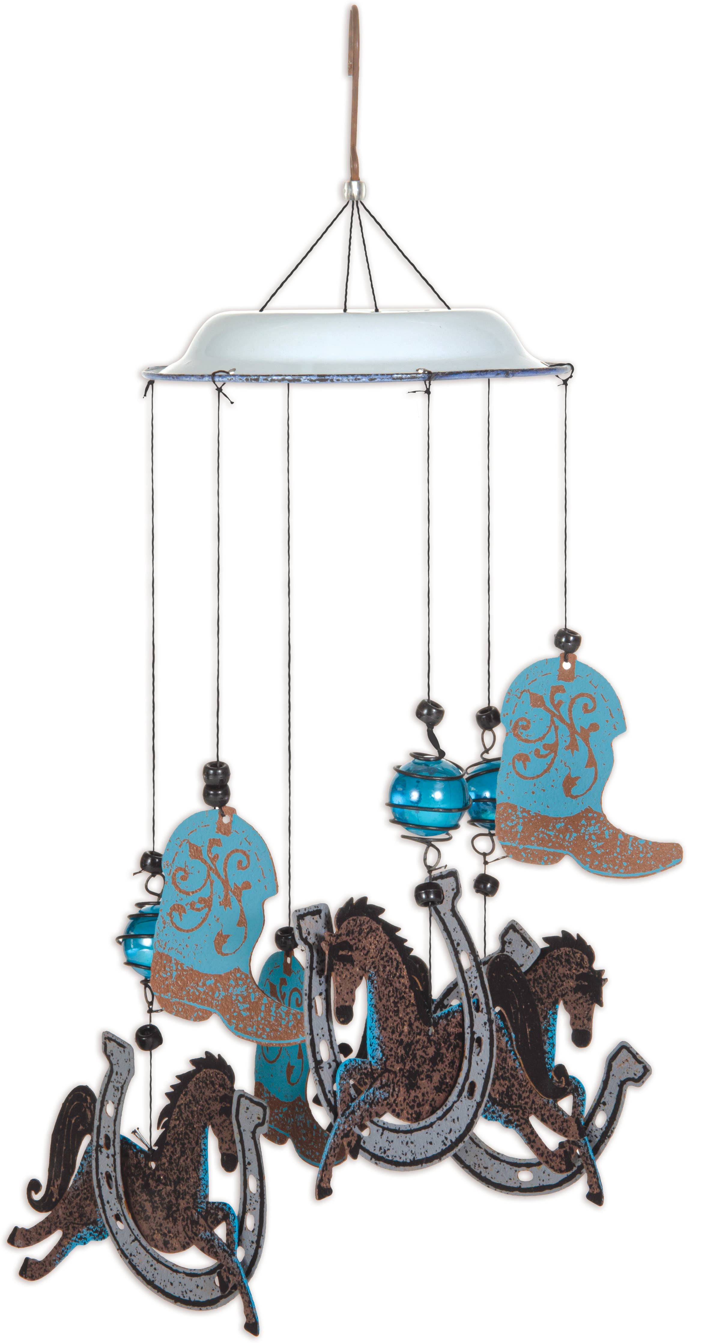 A rustic western-themed metal wind chime featuring cowboy boots, rocking horses, horseshoes, and beads suspended from a light blue metal cup.
