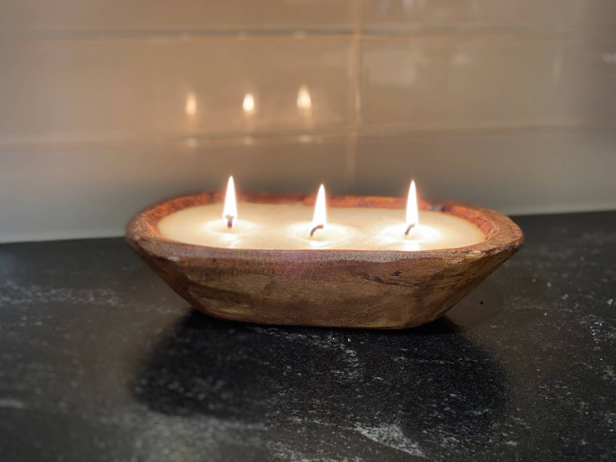 Hand-carved wood bowl candle with soy wax and essential oils