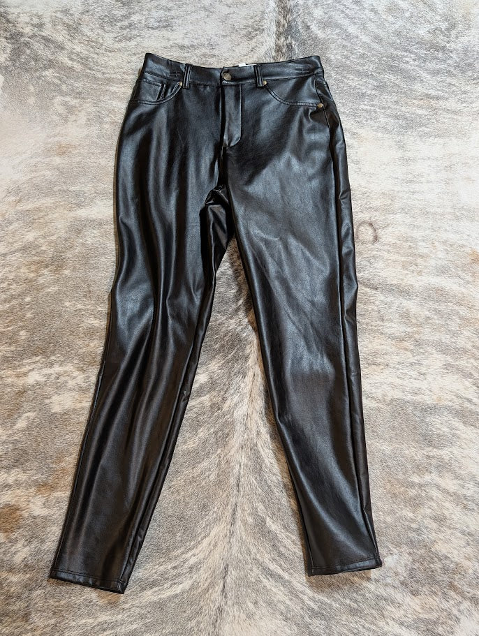 Adyson Parker Vegan Leather Pants on a grey and white surface