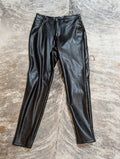 Adyson Parker Vegan Leather Pants on a grey and white surface
