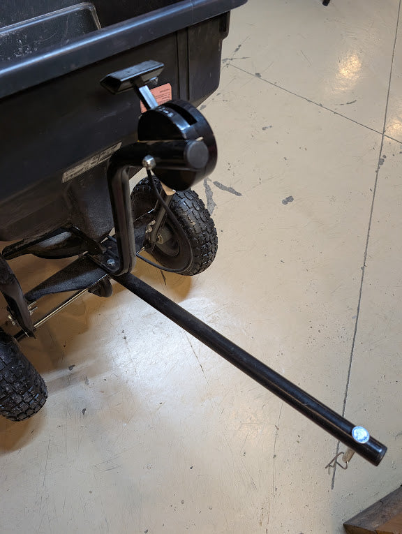 Black wheelbarrow with a lever and towing connection