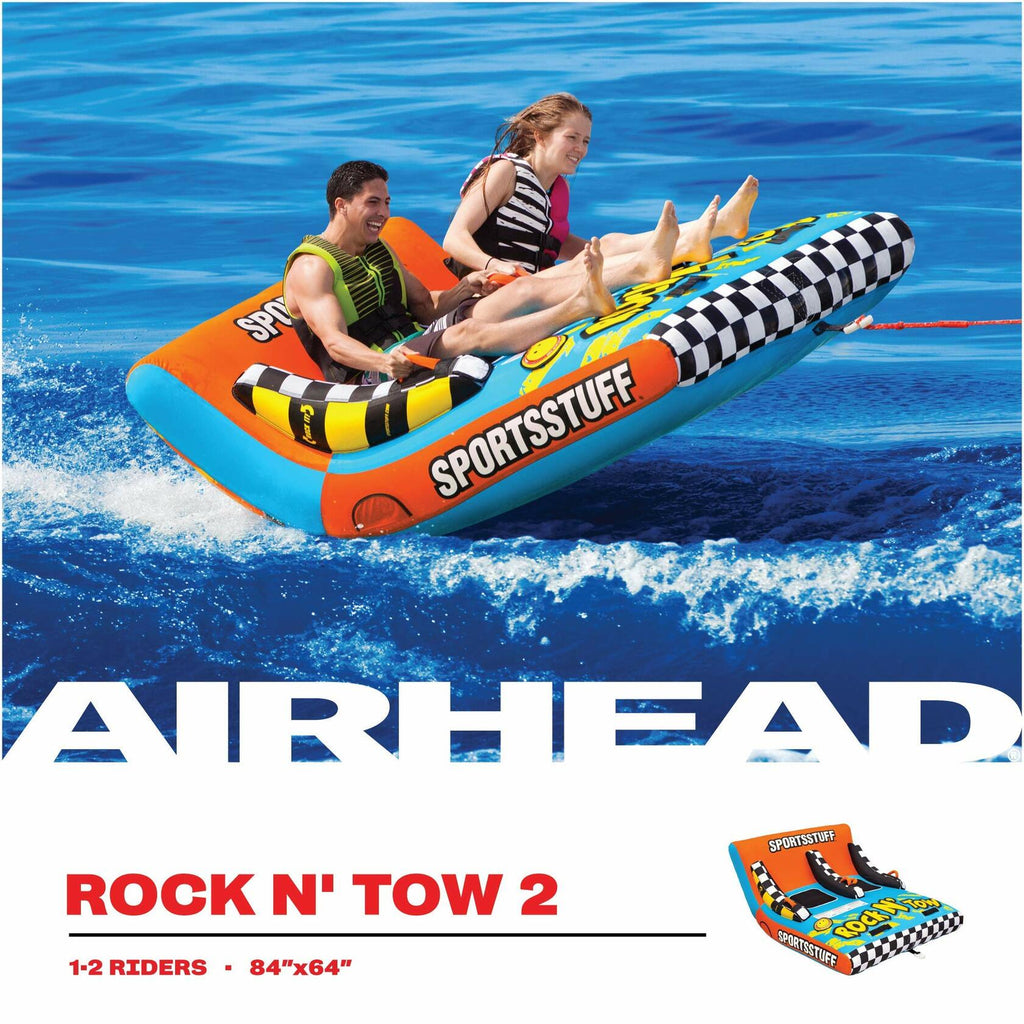 Inflatable water toy with two people on towable watercraft