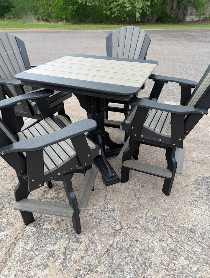 Black and Barnboard outdoor patio set with 4 swivel chairs and a table in  the bar height.