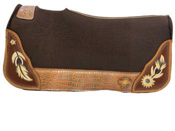 Brown saddle pad with decorative elements on a white background