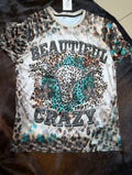 Beautiful and Crazy polyester graphic tee with leopard print and steer head design