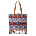 Tote bag with aztec pattern and cowhide design on a white background