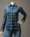 Blue and black plaid Western show shirt with rhinestone-encrusted collar on a mannequin.