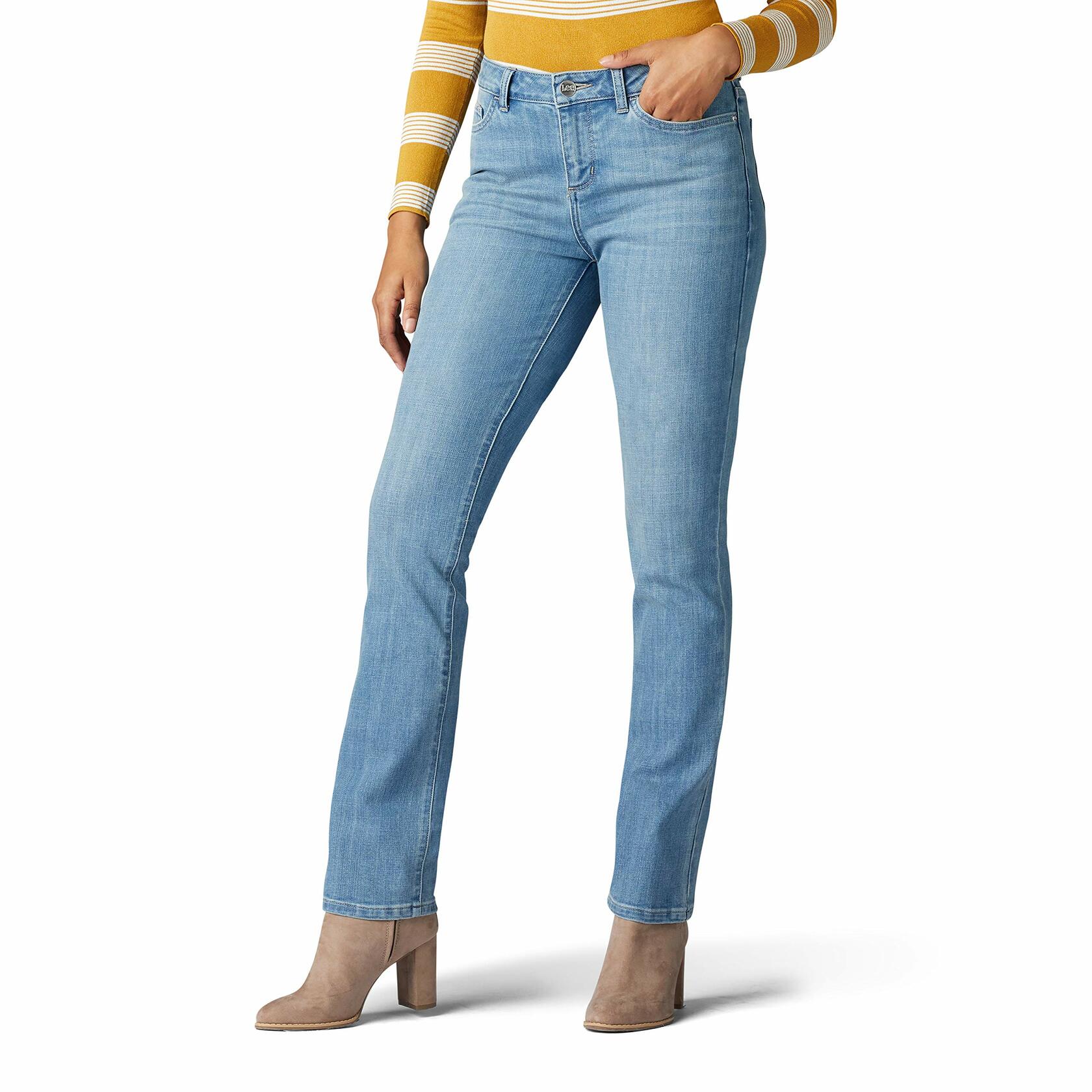 Person wearing light blue jeans and a striped sweater on a white background