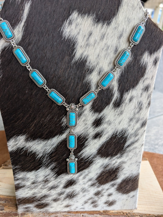 Western bohemian necklace with turquoise stones and antique metal accents