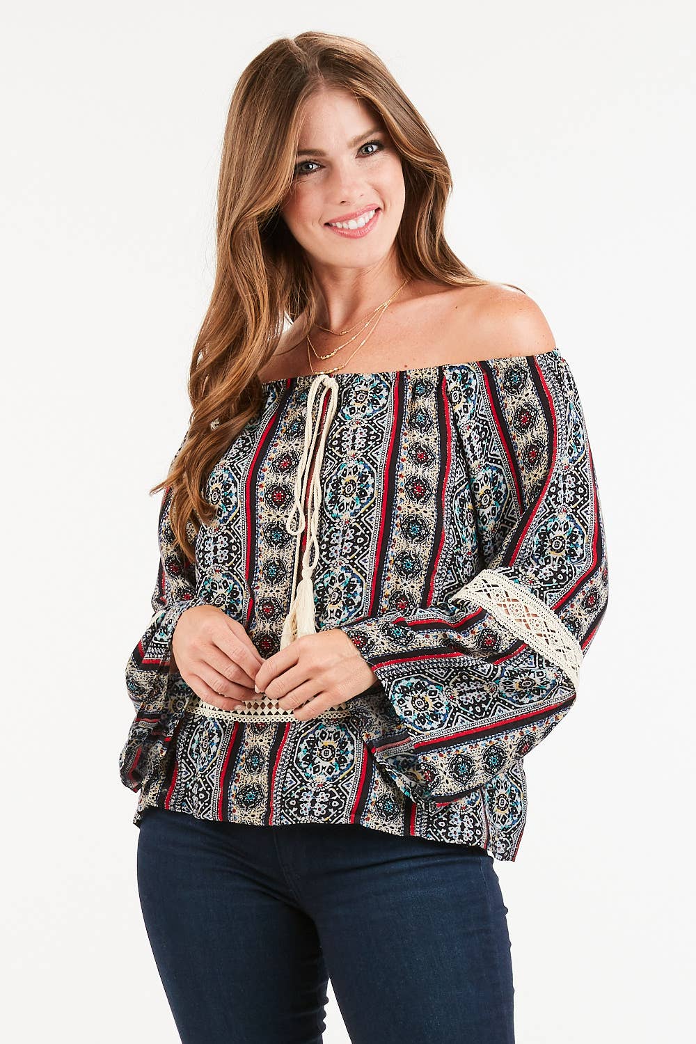 Boho off-shoulder blouse with bell sleeves and paisley print on mannequin