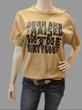 Mannequin wearing a beige t-shirt with text in a clothing store