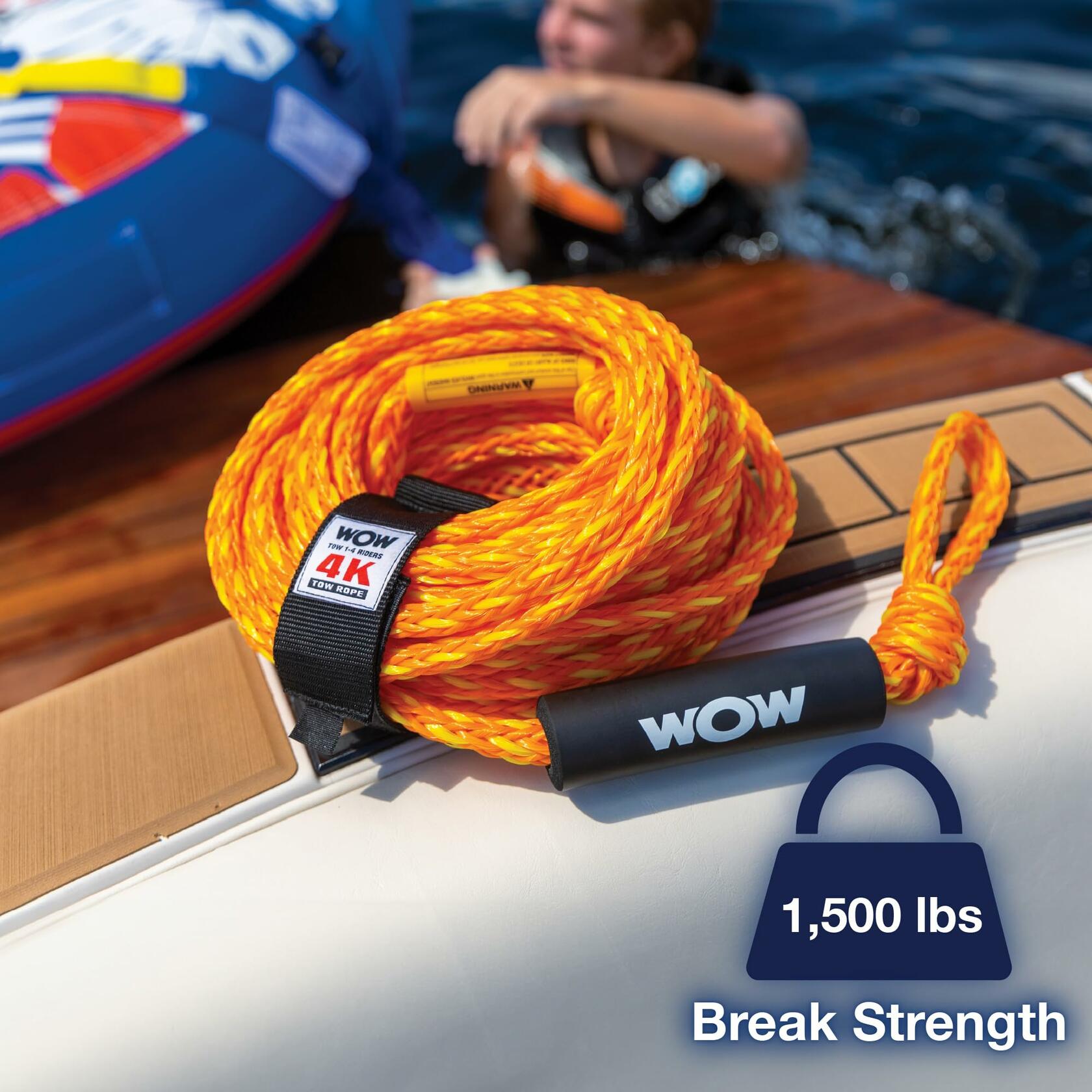 Orange tow rope with 'WOW' branding on a boat, showing break strength of 1,500 lbs.