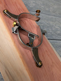 Cowgirl riding spurs with brass rowel