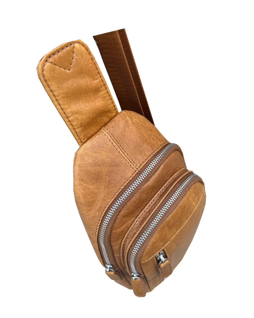 Top view of a leather sling bag with a white background