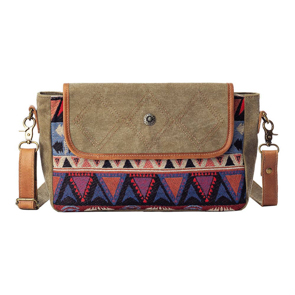 Canvas Aztec pattern shoulder bag with a white background.