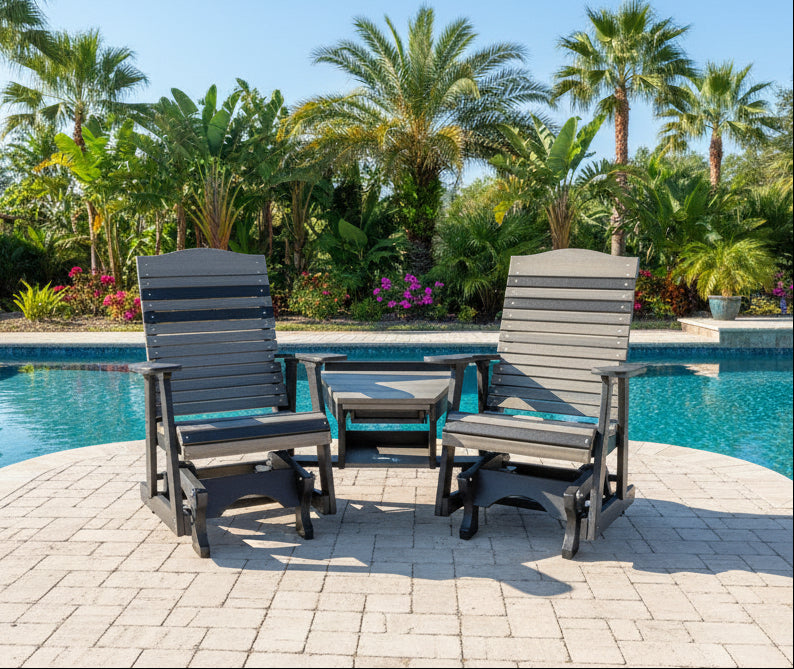 Comfy Deluxe Gliding Settee beside a pool with palm trees