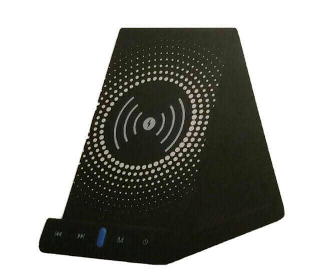 Copia wireless charging speaker with smartphone placed on top charging