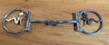 Stainless cowgirl snaffle bit with a dogbone mouth piece.