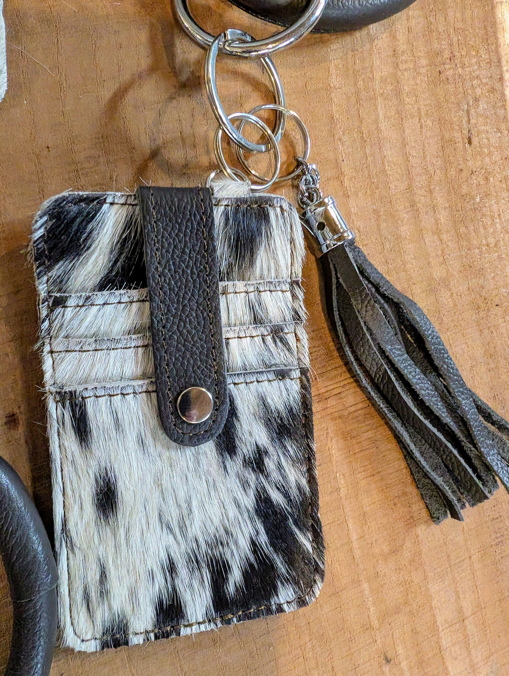 Cowhide cardholder bangle close up view 