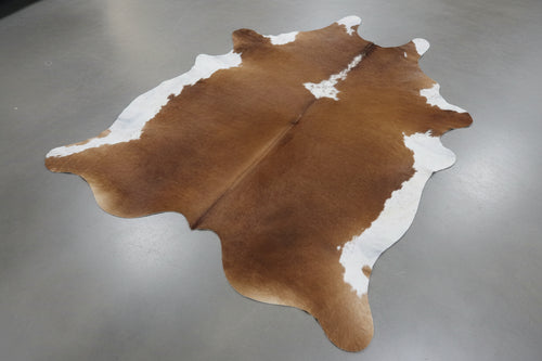 Red & white large cowhide rug