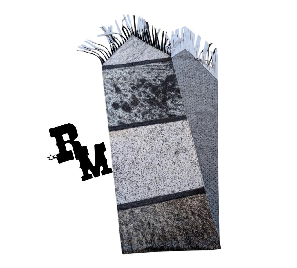 Black and White speckled table runner with RM brand