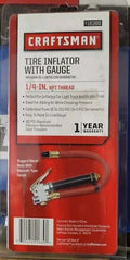 Craftsman tire inflator with gauge in packaging, predominantly red and black with product information.
