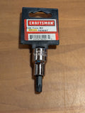 Torx bit with Craftsman packaging on a wooden surface