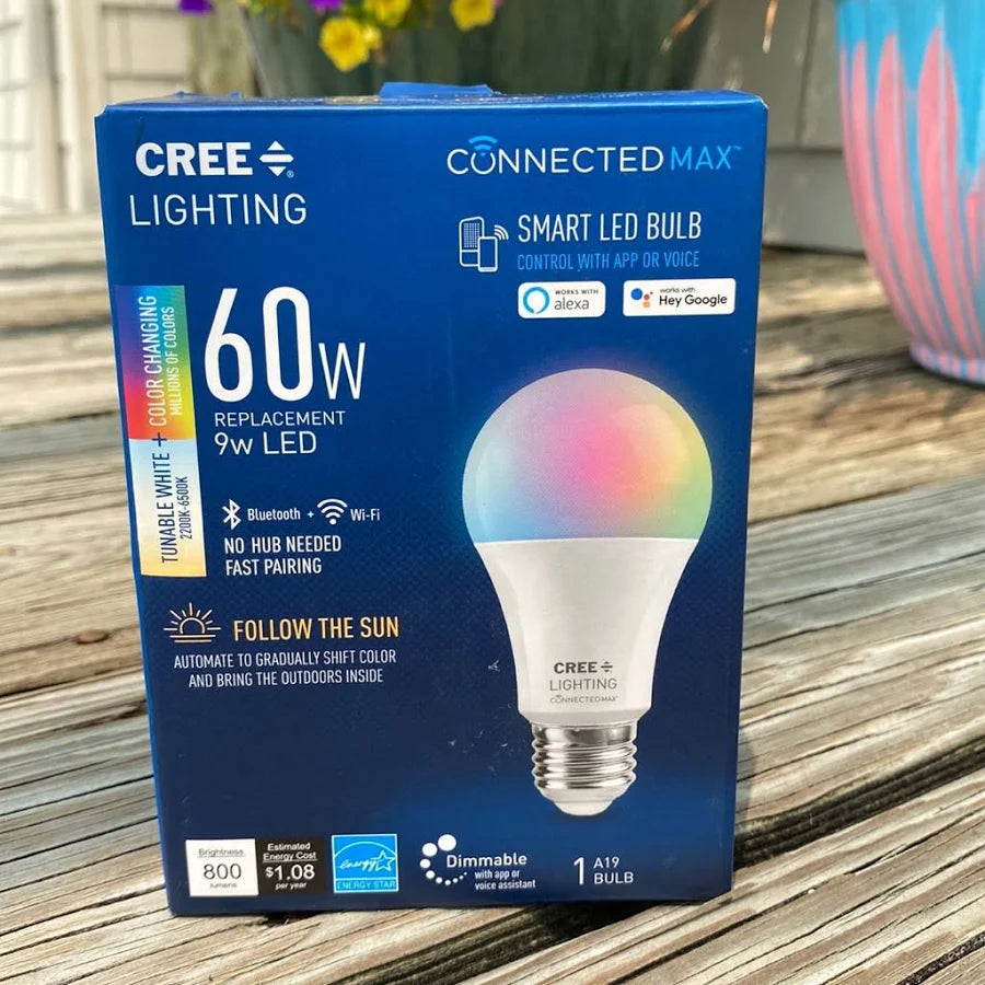 Cree Lighting smart LED bulb packaging on a wooden surface