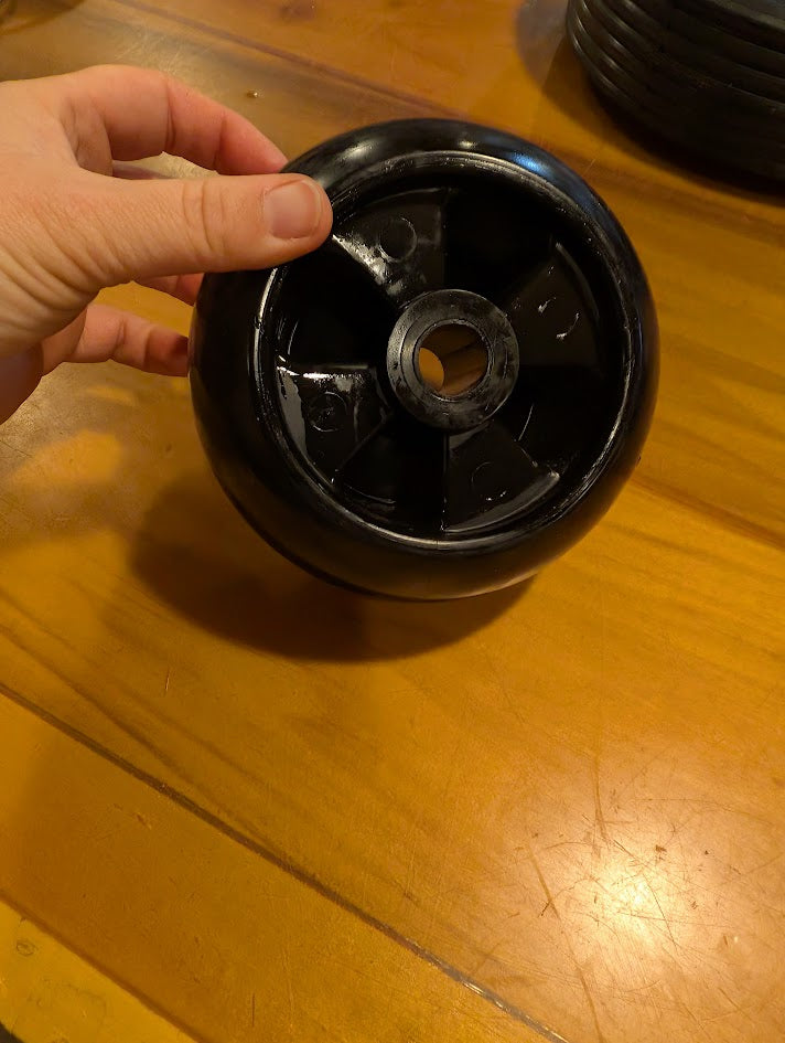 Black Plastic wheel for mower deck